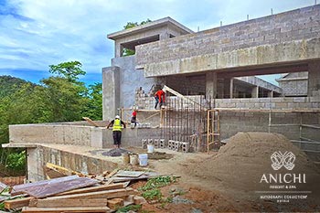 Ход строительства Anichi Resort & Spa за март 2024: рабочие возводят стены входного здания